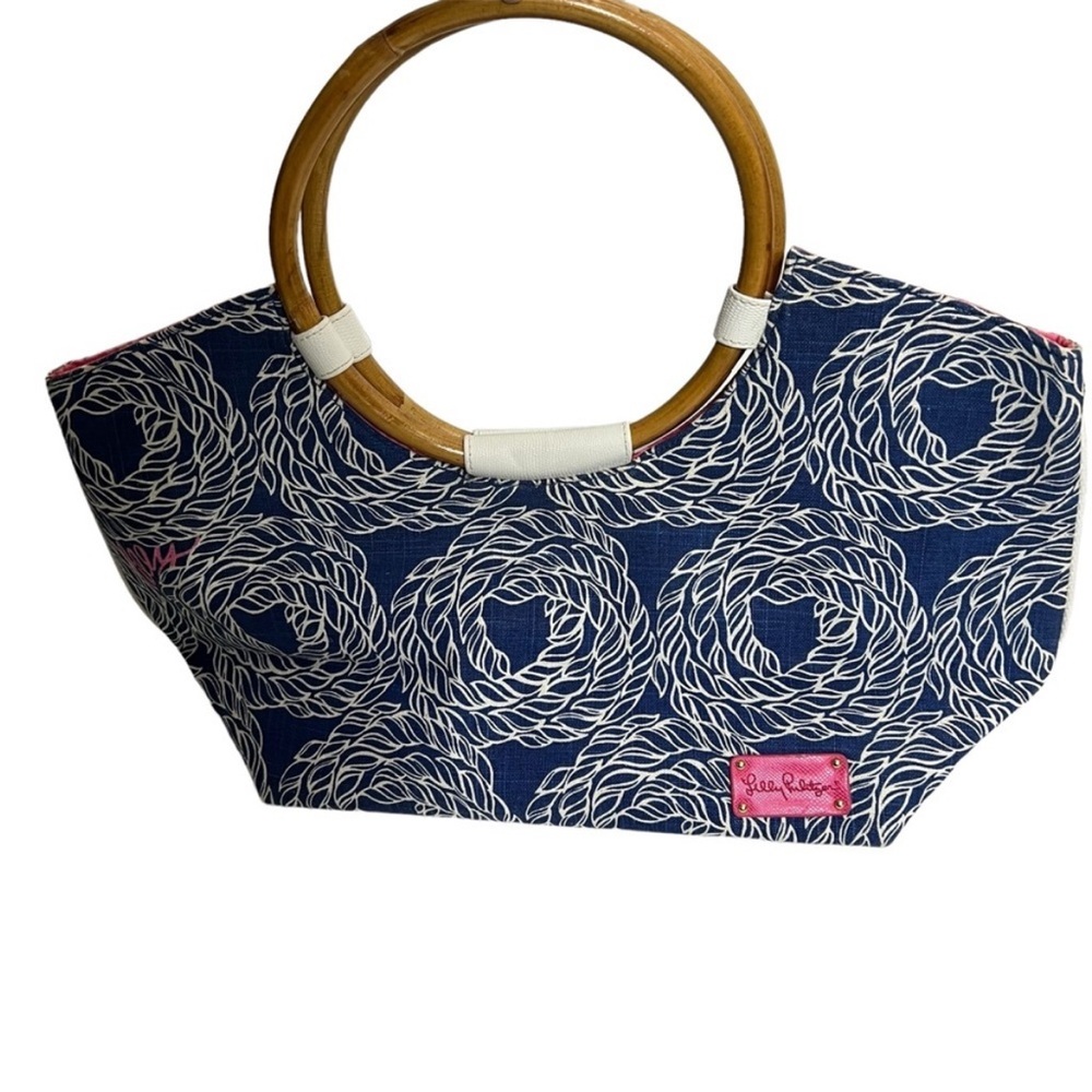 Lilly Pulitzer Navy and White Canvas bag with bamboo handles.